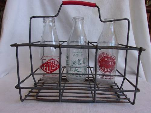 Vintage retro milk bottle carrier with 3 one pint milk bottles