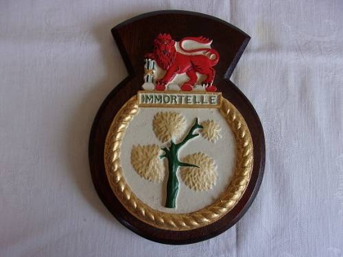 Vintage SAS Immortelle cast iron plaque