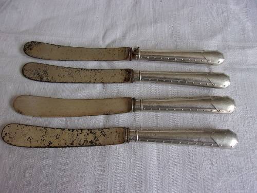 Set of 4 antique butter knives with Sterling silver handles