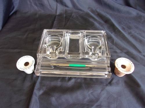 Vintage glass pen stand with 2 J.C. Juta & Co inkwells and a dip pen
