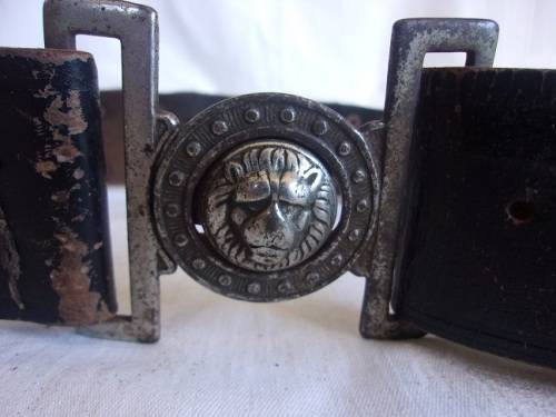 Vintage ammunition bandolier with lion head buckle