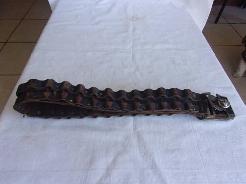 Vintage ammunition bandolier with lion head buckle