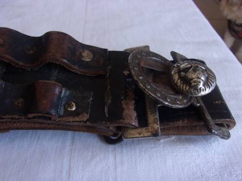 Vintage ammunition bandolier with lion head buckle