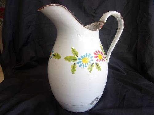 Vintage enamel jug and plughole strainer for 1 bid