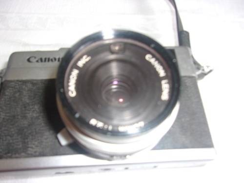 Vintage Canon Canonet 28 camera in original cover