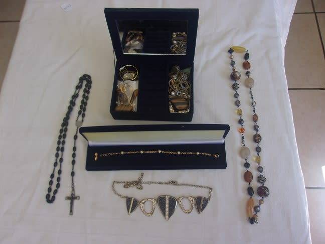 Large lot of vintage costume jewellery in a jewellery box