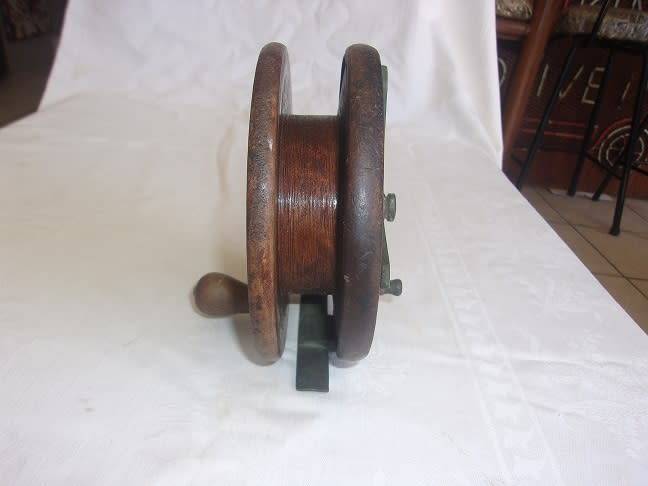 Vintage wood and brass centrepin fishing reel