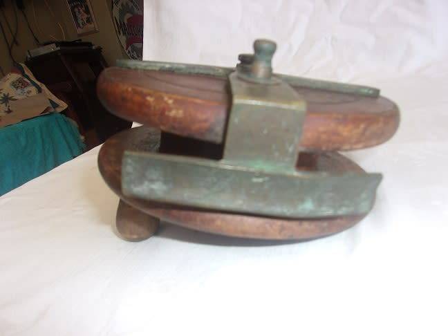 Vintage wood and brass centrepin fishing reel