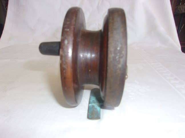 Vintage wood and brass centrepin fishing reel