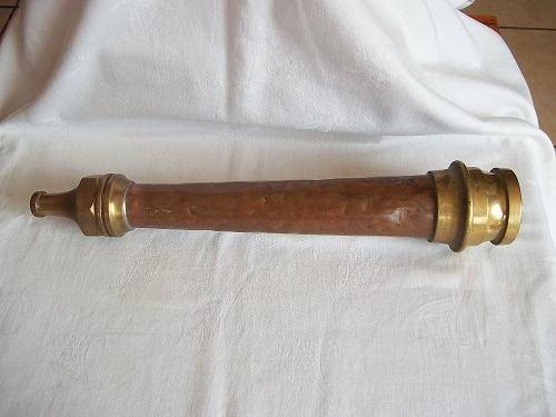 Antique brass and copper fire hose nozzle