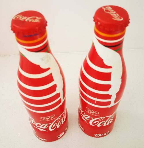 2 Coca Cola Olympic Partner Metal Bottles with Caps