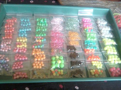 Acrylic bead mix,wax cord,pendants and seedbeads..bid on 80 pkts for all on photo