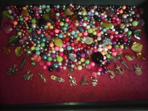 500 glass beads plus 30 fancy beads and shell beads,10 charms