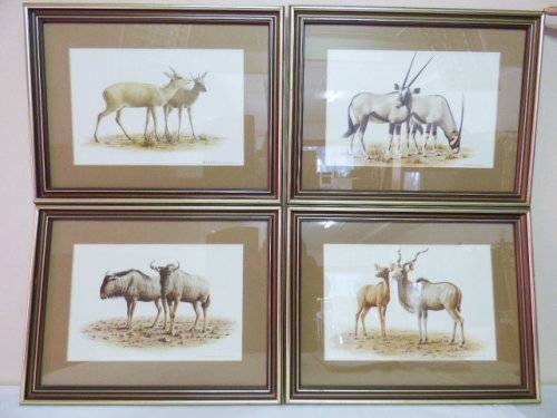 4 EXQUISITE SIGNED ANIMAL PRINTS OF A KUDU, GREY DUIKER, BLUE WILDEBEEST AND A GEMSBOK, FRAMED!!