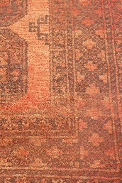 AN INCREDIBLE ANTIQUE PERSIAN CARPET (2.1m x 1.3m) IN EARTHY TONES ENCOMPASSED IN CLARET RED COLOURS