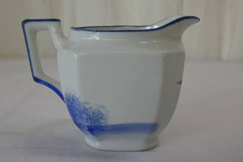 AN AWESOME JAPANESE MADE HAND PAINTED BLUE AND WHITE PORCELAIN MILK JUG