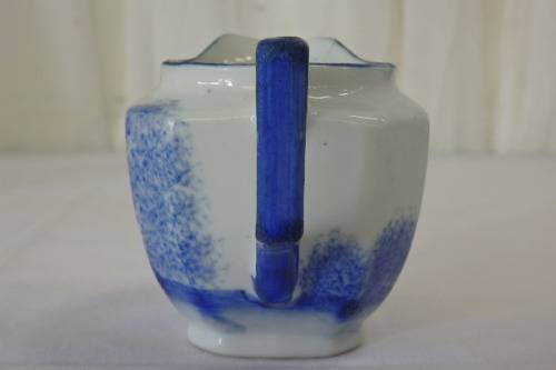 AN AWESOME JAPANESE MADE HAND PAINTED BLUE AND WHITE PORCELAIN MILK JUG