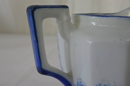 AN AWESOME JAPANESE MADE HAND PAINTED BLUE AND WHITE PORCELAIN MILK JUG