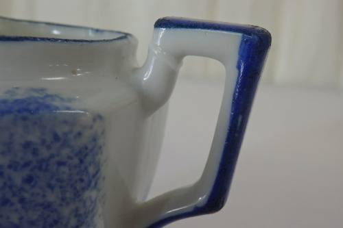 AN AWESOME JAPANESE MADE HAND PAINTED BLUE AND WHITE PORCELAIN MILK JUG