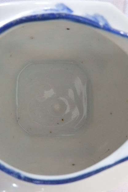 AN AWESOME JAPANESE MADE HAND PAINTED BLUE AND WHITE PORCELAIN MILK JUG