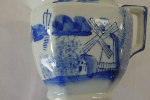 AN AWESOME JAPANESE MADE HAND PAINTED BLUE AND WHITE PORCELAIN MILK JUG