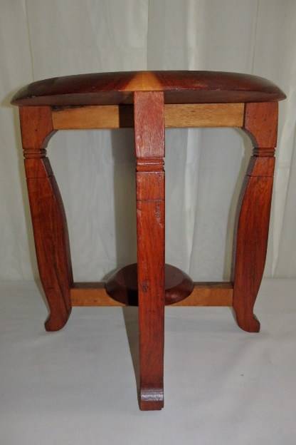 AN AWESOME AND SOLIDLY MADE SOLID TEAK FOUR-LEGGED STOOL IN EXCELLENT CONDITION