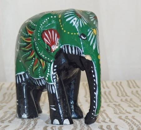A STUNNING COLLECTION OF SIX WOODEN CARVED ANIMAL FIGURINES INCLUDING A STUNNING PAINTED ELEPHANT