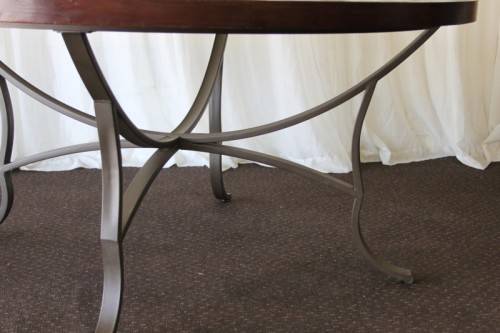 A SPECTACULAR (LARGE) ROUND 6-SEATER PATIO TABLE WITH A BEVELED GLASS TOP AND AMAZING DETAILING