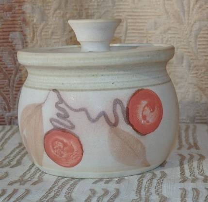 **RS17** A stoneware milk jug and lidded sugar bowl set with gorgeous hand painted detailing