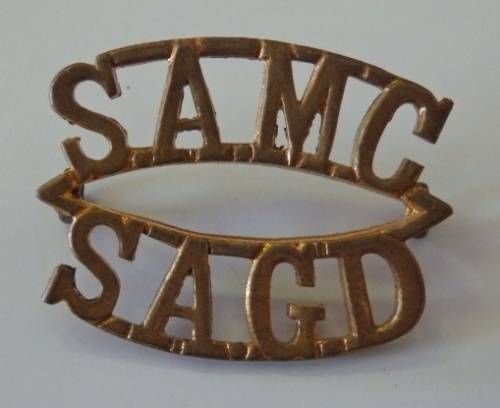 A STUNNING WWII ''SAMC/ SAGB'' (SOUTH AFRICAN MEDICAL CORPS) SHOULDER TITLE BADGE