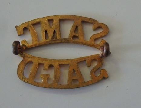 A STUNNING WWII ''SAMC/ SAGB'' (SOUTH AFRICAN MEDICAL CORPS) SHOULDER TITLE BADGE