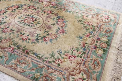 A WONDERFUL ANTIQUE PURE WOOL PILE CARPET (2.9m x 1.8m) WITH GREENS, PINKS, TANS AND EARTHY TONES