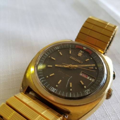 A STUNNING VINTAGE GOLD PLATED SEIKO AUTOMATIC "BELL-MATIC" (MODEL 4006-6031) GENTS WRIST WATCH