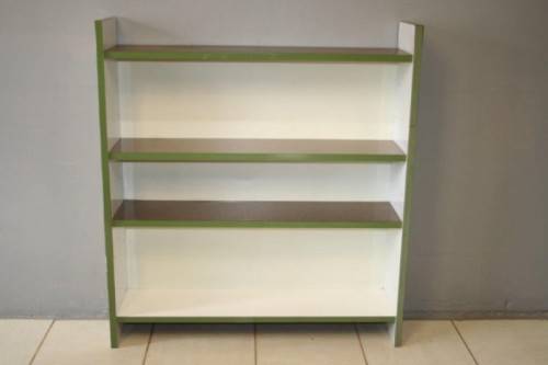 A GORGEOUS WHITE AND BROWN BOOK CASE WITH GREEN FACADES - PERFECT FOR A STUDY OR OFFICE