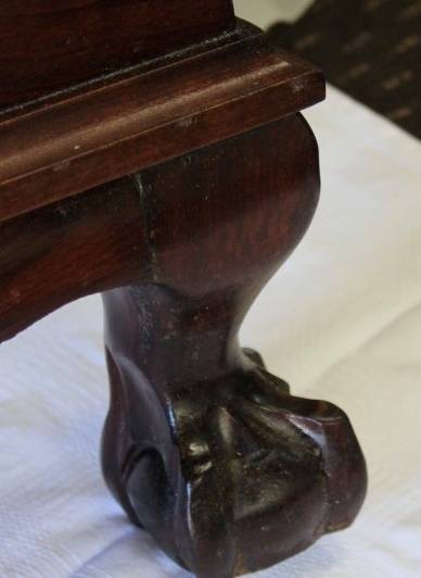 A SUPERB ANTIQUE SOLID STINK WOOD BALL AND CLAW HEADBOARD AND FOOT BOARD SET