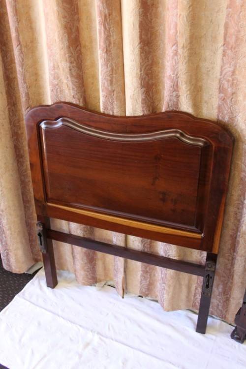 A SUPERB ANTIQUE SOLID STINK WOOD BALL AND CLAW HEADBOARD AND FOOT BOARD SET
