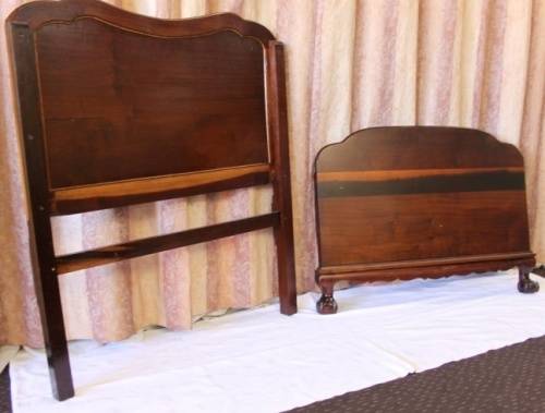 A SUPERB ANTIQUE SOLID STINK WOOD BALL AND CLAW HEADBOARD AND FOOT BOARD SET