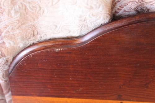 A SUPERB ANTIQUE SOLID STINK WOOD BALL AND CLAW HEADBOARD AND FOOT BOARD SET