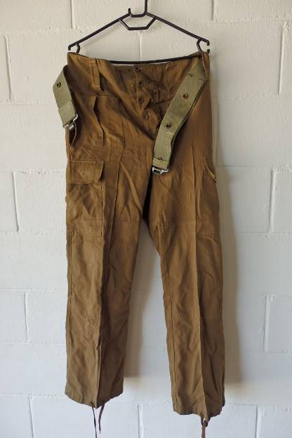 A GREAT PAIR OF GREEN/ BROWN MILITARY CARGO PANTS WITH BELT IN WONDERFUL CONDITION