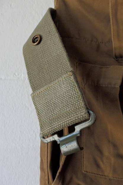 A GREAT PAIR OF GREEN/ BROWN MILITARY CARGO PANTS WITH BELT IN WONDERFUL CONDITION