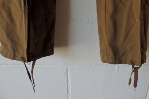 A GREAT PAIR OF GREEN/ BROWN MILITARY CARGO PANTS WITH BELT IN WONDERFUL CONDITION