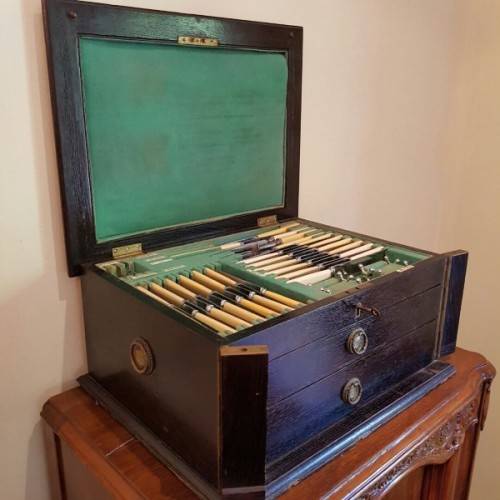 A spectacular antique Hallmarked sterling silver Walker & Hall boxed 12 place setting cutlery set