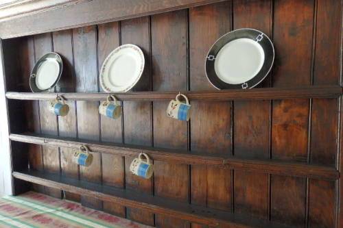 An incredible large antique (c. mid 1800s) oak wall display cabinet w/ three spacious shelves