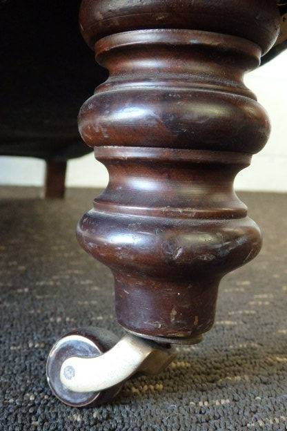 A beautiful "oversized" comfortable vintage arm chair on its original castors in fabulous condition
