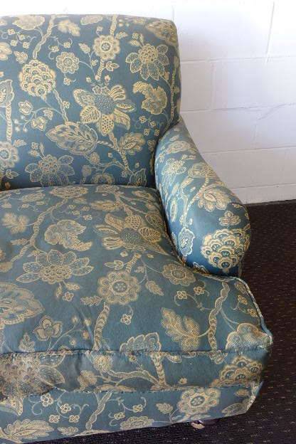 A beautiful "oversized" comfortable vintage arm chair on its original castors in fabulous condition