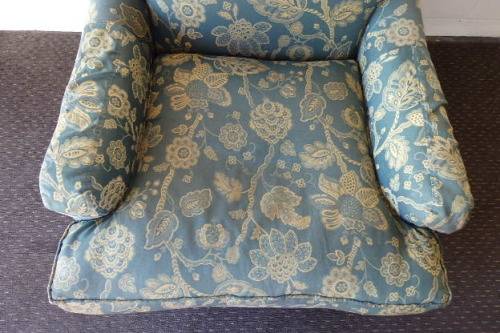 A beautiful "oversized" comfortable vintage arm chair on its original castors in fabulous condition