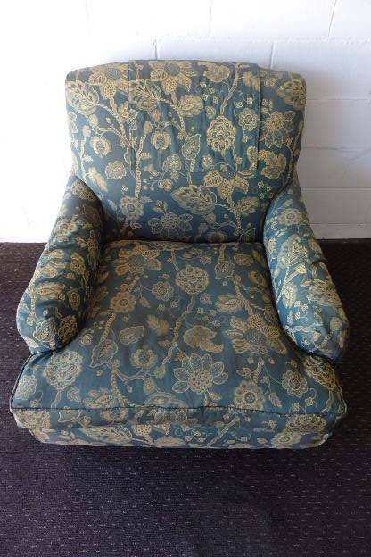 A beautiful "oversized" comfortable vintage arm chair on its original castors in fabulous condition