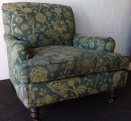 A beautiful "oversized" comfortable vintage arm chair on its original castors in fabulous condition