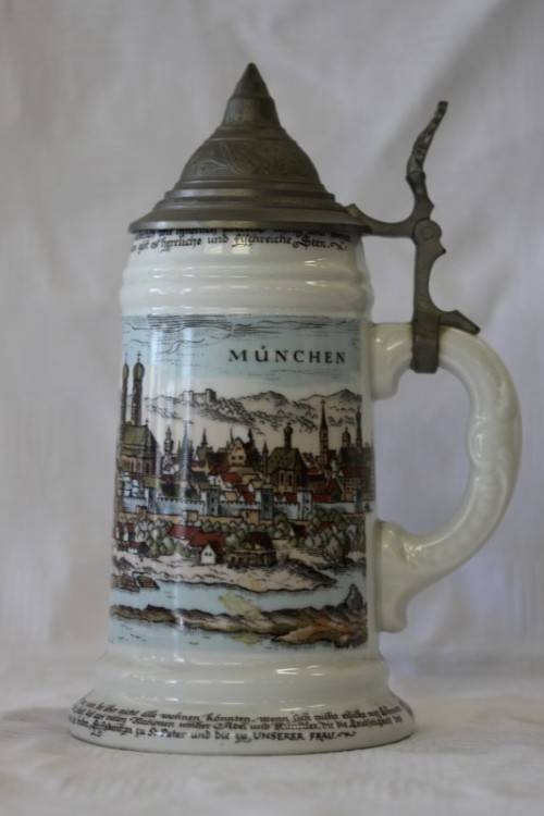 An awesome vintage white German made ceramic (lidded) Stein with "Munich" related transfer prints