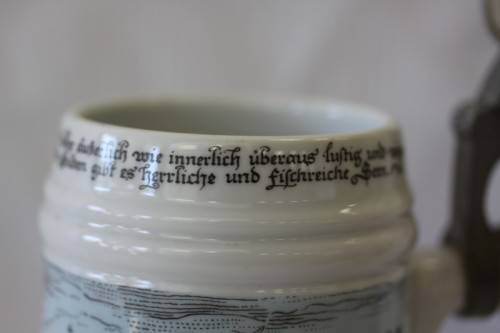 An awesome vintage white German made ceramic (lidded) Stein with "Munich" related transfer prints